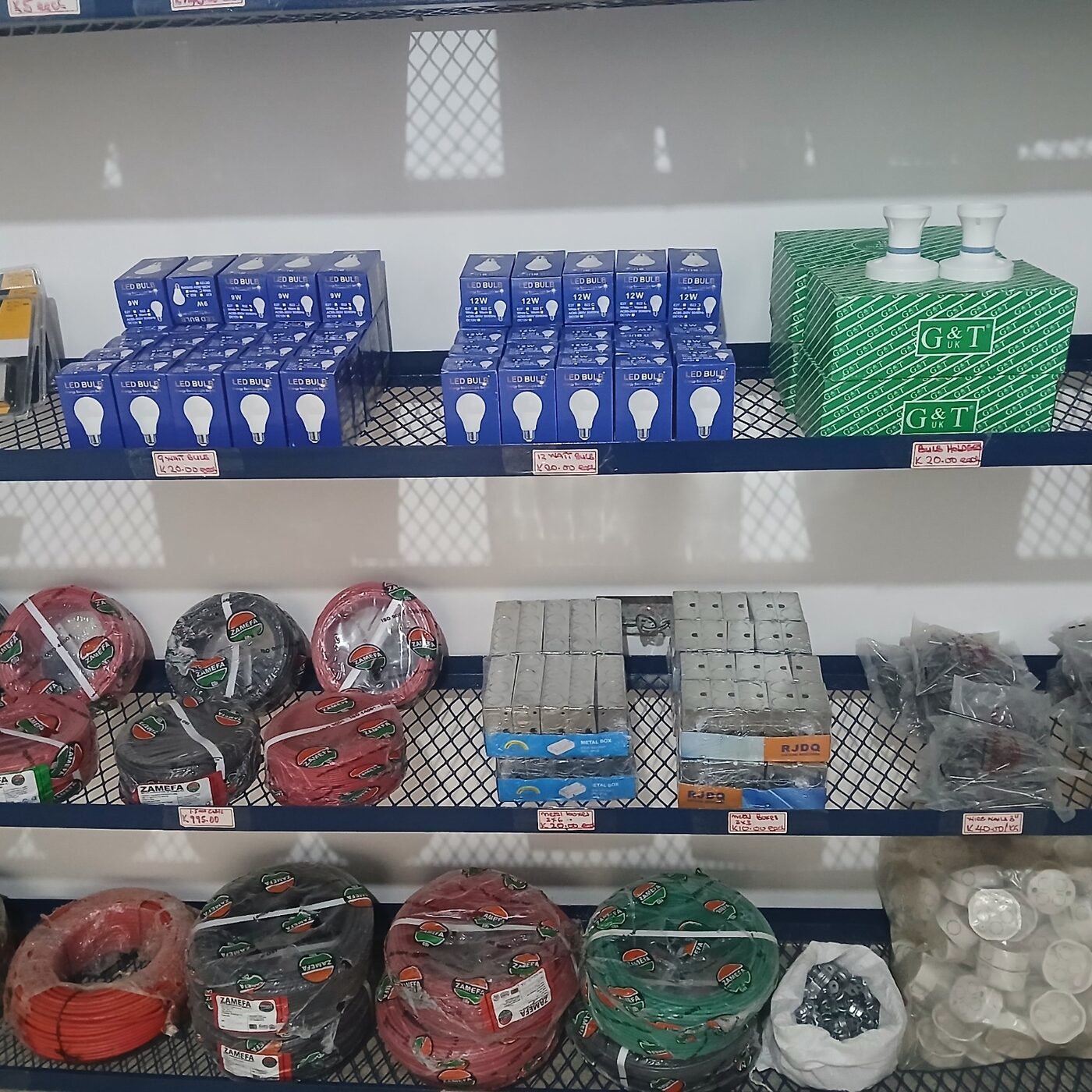 LED lamps, electrical cables and sockets displayed at the EMVL Luwingu outlet